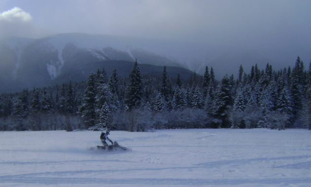 Rad rider Peter Schlief enjoys the mountain backdrop. 