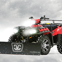 A Polaris Sportsman with a Cycle Country straight steel blade accessory.