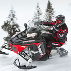 Photo of a rider on a Polaris snowmobile.