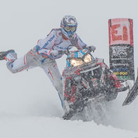 Photo Keith Curtis cutting on his snowmobile