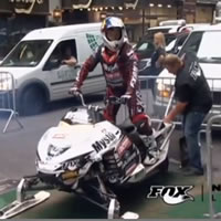 A 15 foot stunt jump on snowmobile to launch NASDAQ market site 