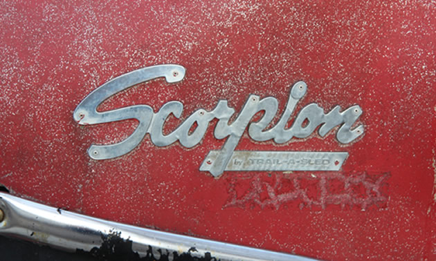 Scorpion logo in chrome. 