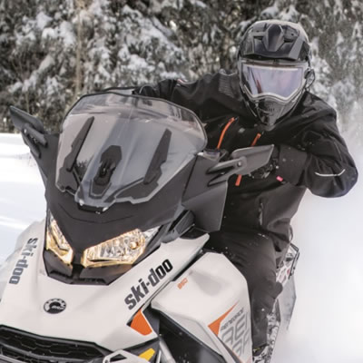 Snowmobile equipped with adjustable windshield. 