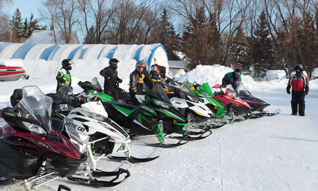 Snowmobilers line up for the Sled for eternity ride in 2015.