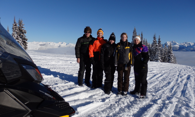 Snowmobiling is a family affair for the Yaworskis (L to R): James, Michael, Katrina, Michelle and Carol.