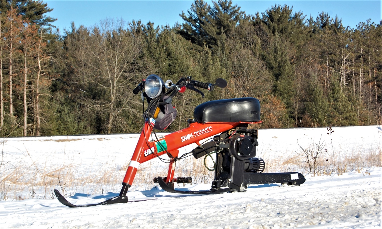 Sno-Runner on a snowy trail