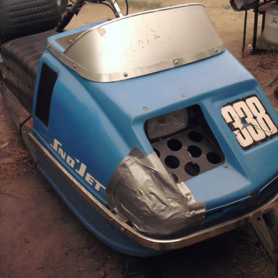 A vintage Sno-Jet sled, powder blue in colour. 