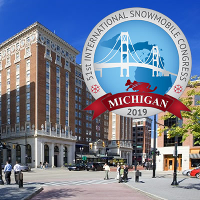 Street scene in downtown Grand Rapids, Michigan with Snowmobile Congress logo. 