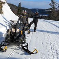 A snowmobiler travels down a groomed trail in the St. Paul region of Alberta.
