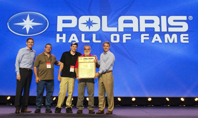 Shown from Left to Right:Tim Larson – Polaris Industries Inc. SVP, Global Customer Excellence; Aaron Woods – Teixeira’s Technician; Russell McRoberts – Teixeira’s Service Manager, Paul Teixeira – Teixeira’s Owner, Scott Wind – Polaris Industries Inc. Chairman and CEO