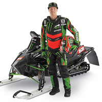 tucker hibbert standing beside his 2015 arctic cat 