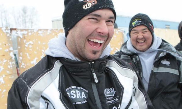 Cory Carter laughing with his pit crew and main sponsor, Shaun Janvier. 