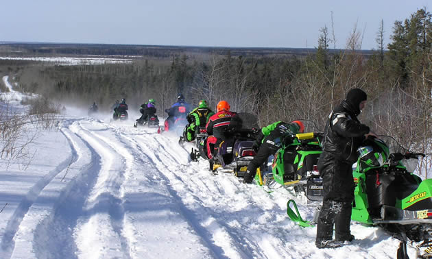 Group heading down the hill on the trail between Clearwater Park and Wanless. 