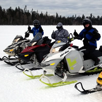 Riders enjoy riding on a lake in the Lakeland Snowmobile club region.