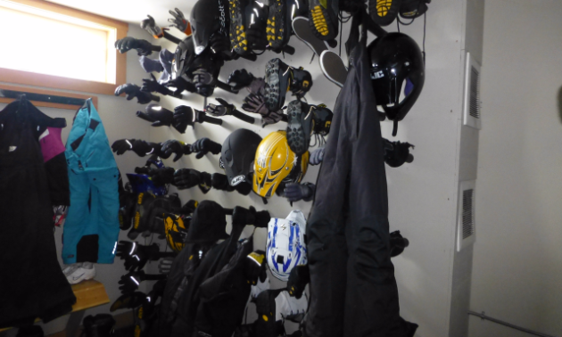 The drying rack at the Timberline Cruisers cabin fills up after a long day of sledding.