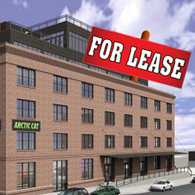 Former Arctic Cat building with For Lease sign on it. 
