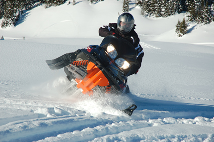 Person snowmobiling