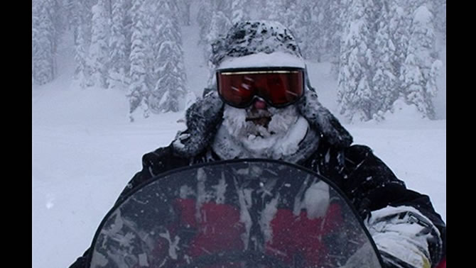 Blue River resident Robin Tyacke covered in snow during a snowstorm in Blue River. 