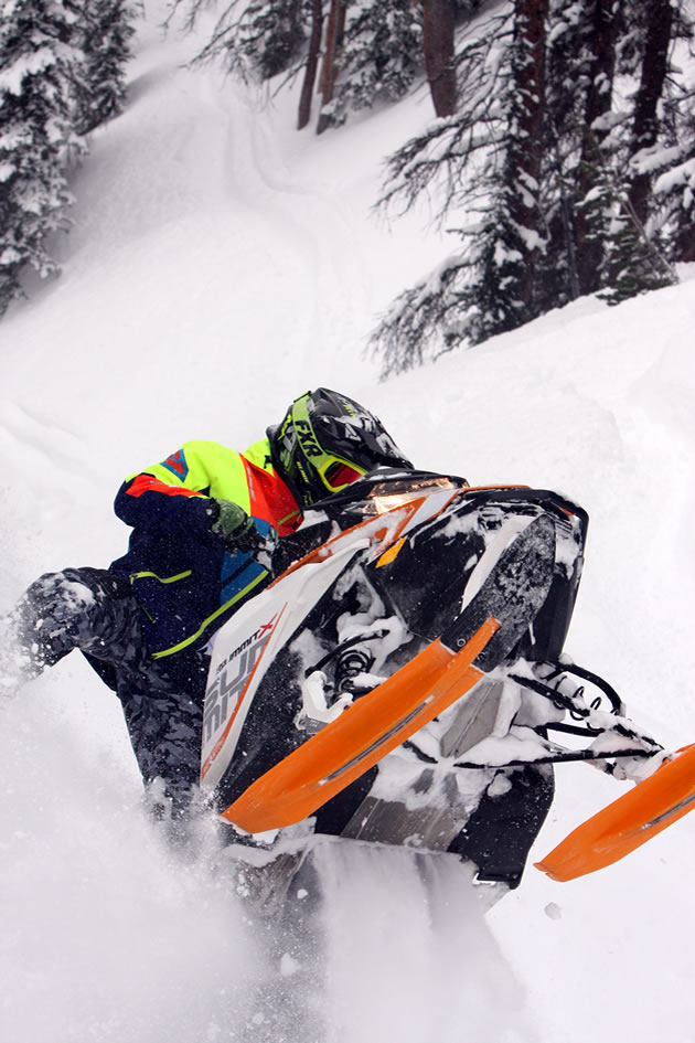 Brett Rasmussen throws a leg on the 2017 Ski-Doo Rev Gen4 850