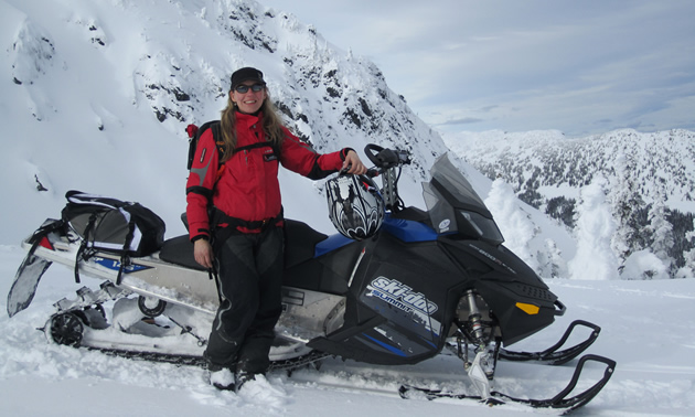 lady on a snowmobile