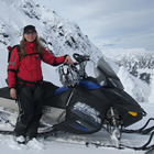 lady on a snowmobile