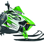 Profile photo of a green Arctic Cat mountain sled. 