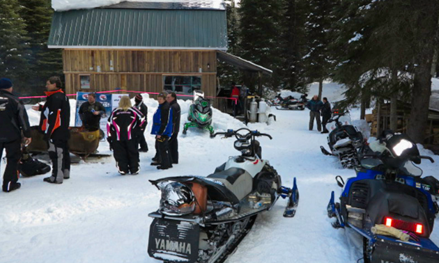 Club members at the snowmobile club's cabin.