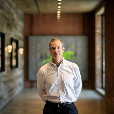 In this Star Tribune photograph Arctic Cat CEO Chris Metz poses in the lobby of the company's new corporate offices.