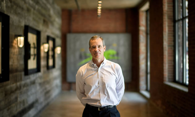 In this Star Tribune photograph Arctic Cat CEO Chris Metz poses in the lobby of the company's new corporate offices.