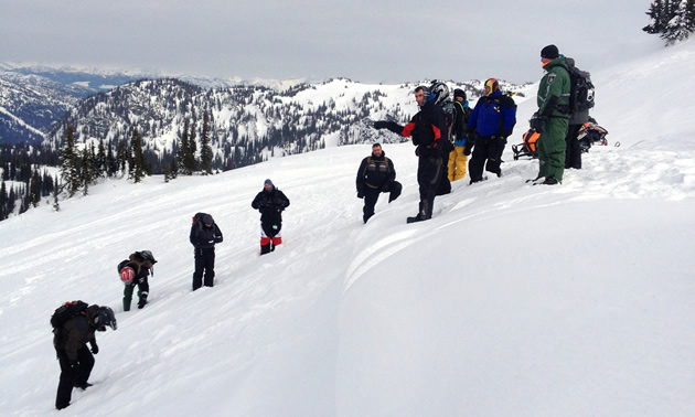 A group of AST students on a small cornice. 