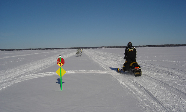 Snowmobiling in Whiteshell Provincial Park, Manitoba.