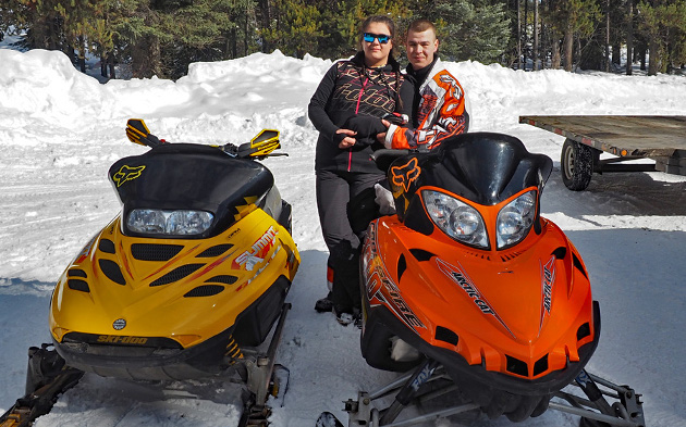 Snowmobiling couple. 