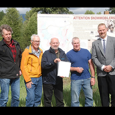 A new agreement between the Cranbrook Snowmobile Club and the BC government will help preserve local Caribou habitat. Pictured above: John Krebs (Director, Resource Management, FLNRO), Doug Hogg (past president, Cranbrook Snowmobile Club), Bill Bennett (Kootenay East MLA), Mike Plant (president, Cranbrook Snowmobile Club), Paul Rasmussen, Regional Executive Director, FLNRO).