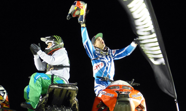 Daniel Bodin tossing his helmet into the air. 