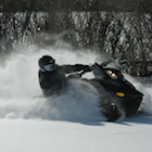 Snowmobile in powder snow