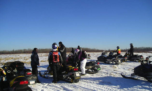 People and snowmobiles