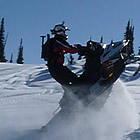 person riding a sled