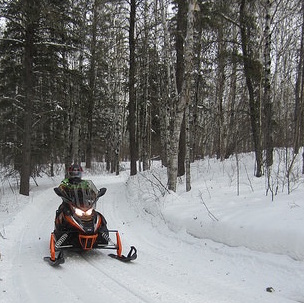 Club member Carl Palke riding the Greenbush trails. Part of the Hudson Bay trails wind through the forest. 