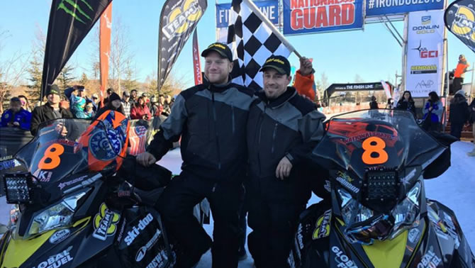 Tyler Aklestad and Tyson Johnson, winners of the 2016 Iron Dog Race. 
