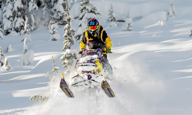 Kelsey taking her sled on a jump