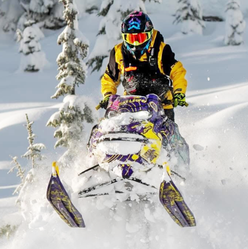 Kelsey Fay crashing through snow on her sled