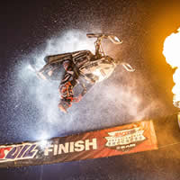 Levi LaVallee doing a backflip at snocross. 