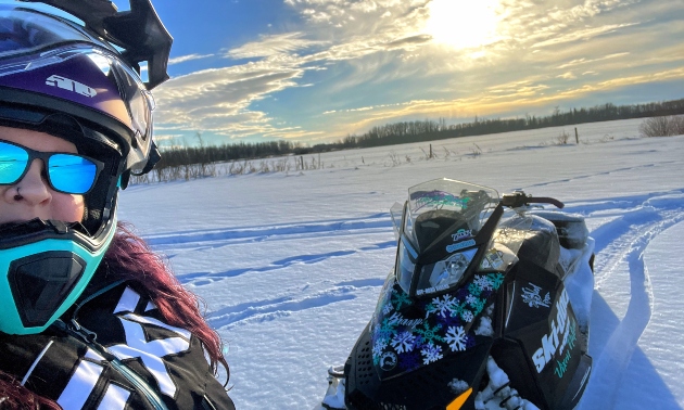 Lisa on the trails with her sled