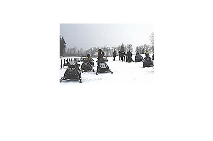 Members of the Twin Lakes Trail Blazers snowmobile club