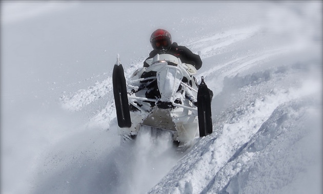 Mark Booth riding his 2013 1100 Turboed Arctic Cat on The Dome, Smithers, B.C.