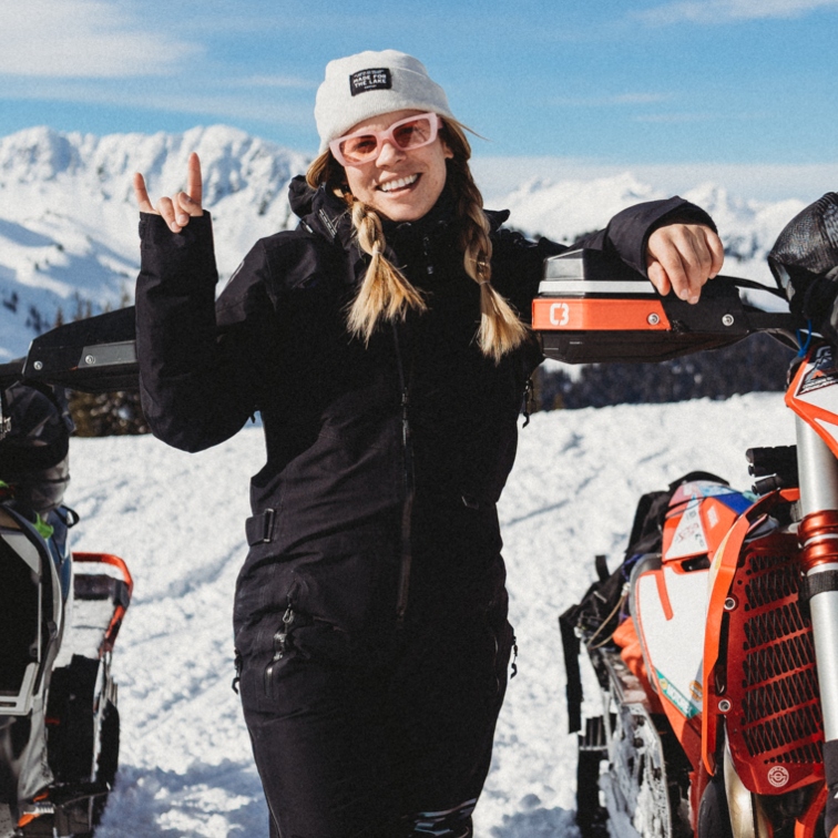 Megan Dawn between two sleds