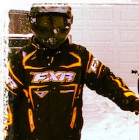 Nathan Simpson and son Dominic on a 2001 summit 800 sled named Stella