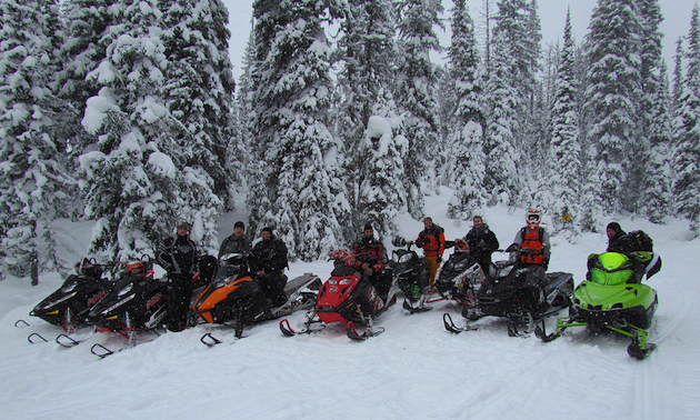 People on snowmobiles.