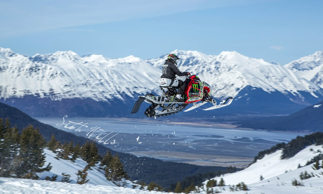 Paul Thacker jumping a sled near Turnagain Pass, Alaska. 