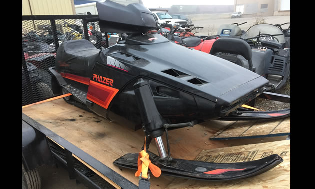 A Yamaha Phazer on a snowmobile trailer